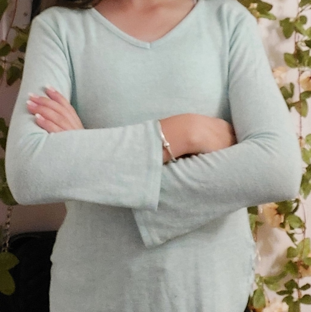 A blue-green shirt